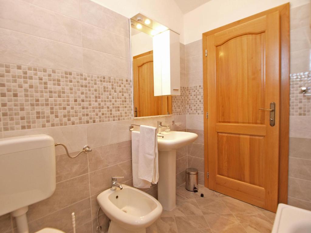 Kúpeľňa v ubytovaní Apartment Zorko 707
