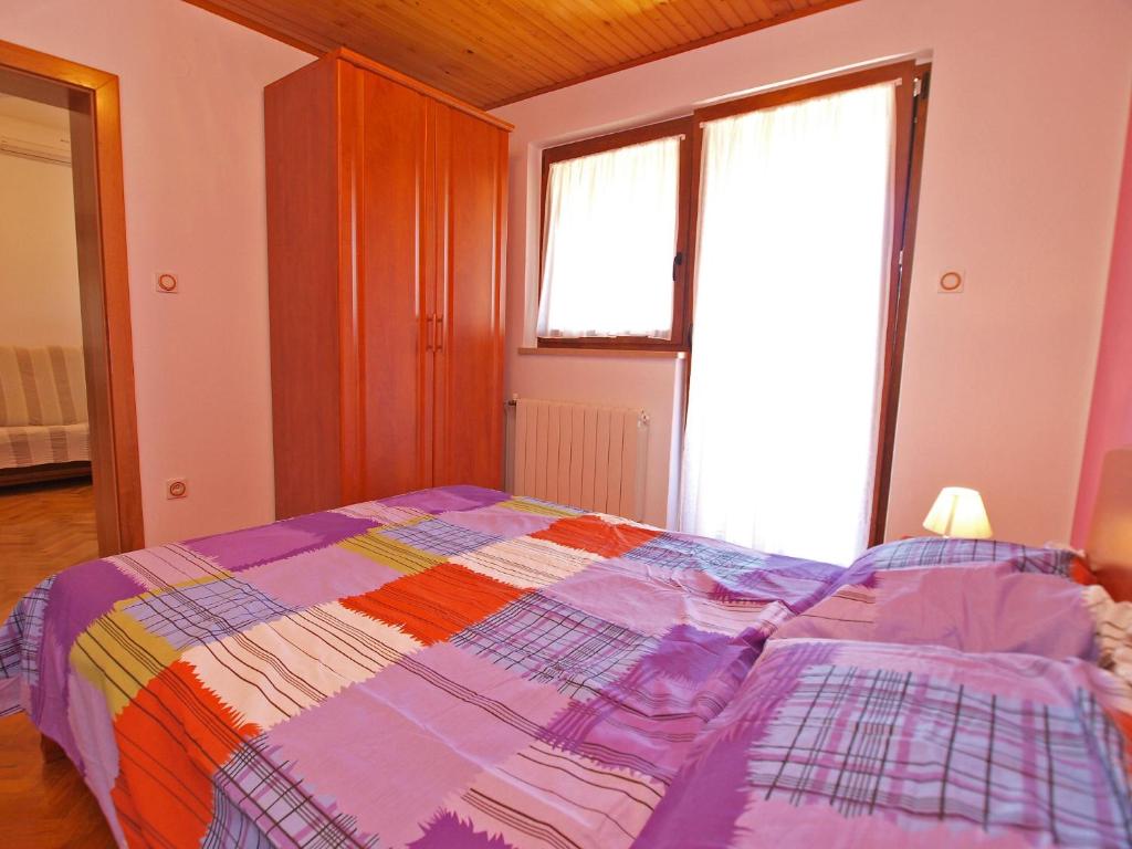 Posteľ alebo postele v izbe v ubytovaní Apartment Zorko 707