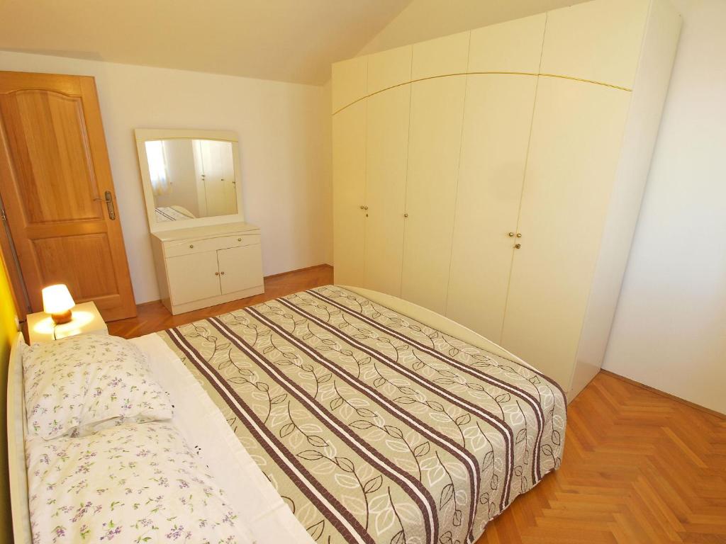 Posteľ alebo postele v izbe v ubytovaní Apartment Zorko 707