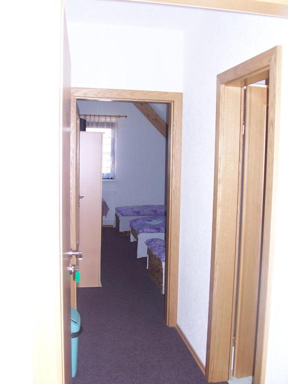 Postel nebo postele na pokoji v ubytování Penzion Chanos