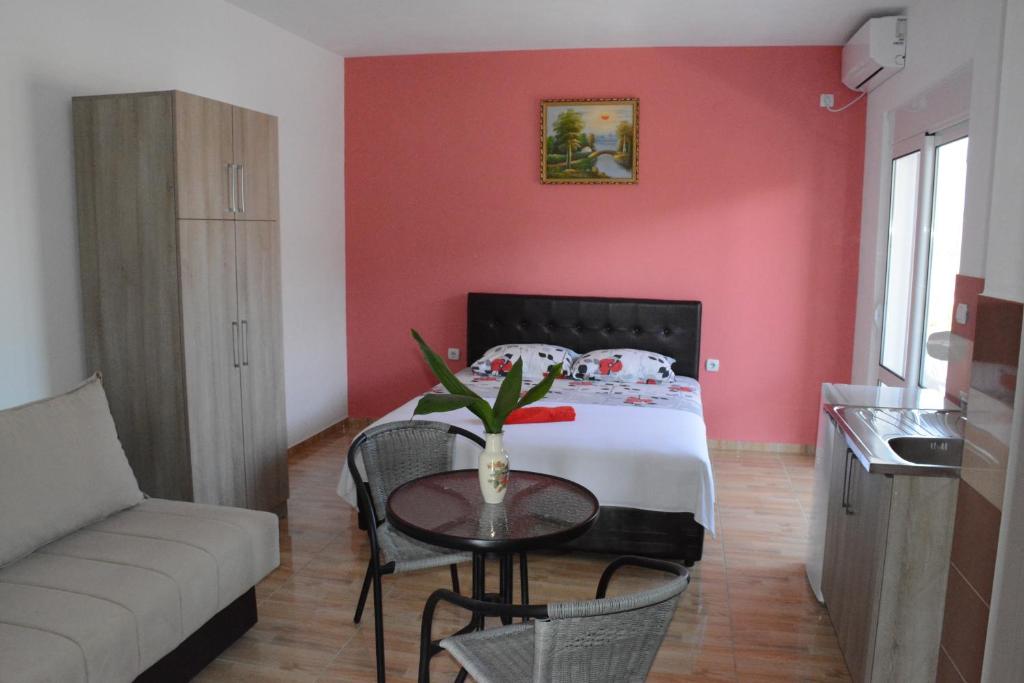 Voodi või voodid majutusasutuse Apartments Flamida toas