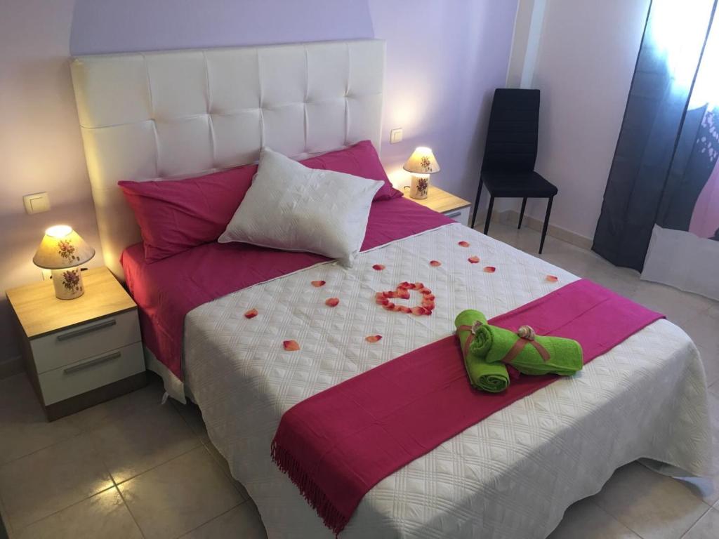 Postel nebo postele na pokoji v ubytování Phenix Home