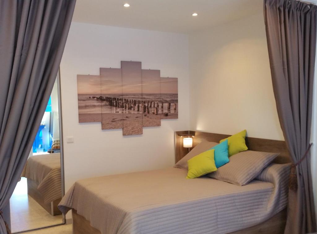 Ένα ή περισσότερα κρεβάτια σε δωμάτιο στο Appartement le Valmont