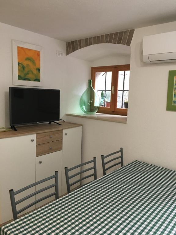 TV a/nebo společenská místnost v ubytování Apartment Filipas