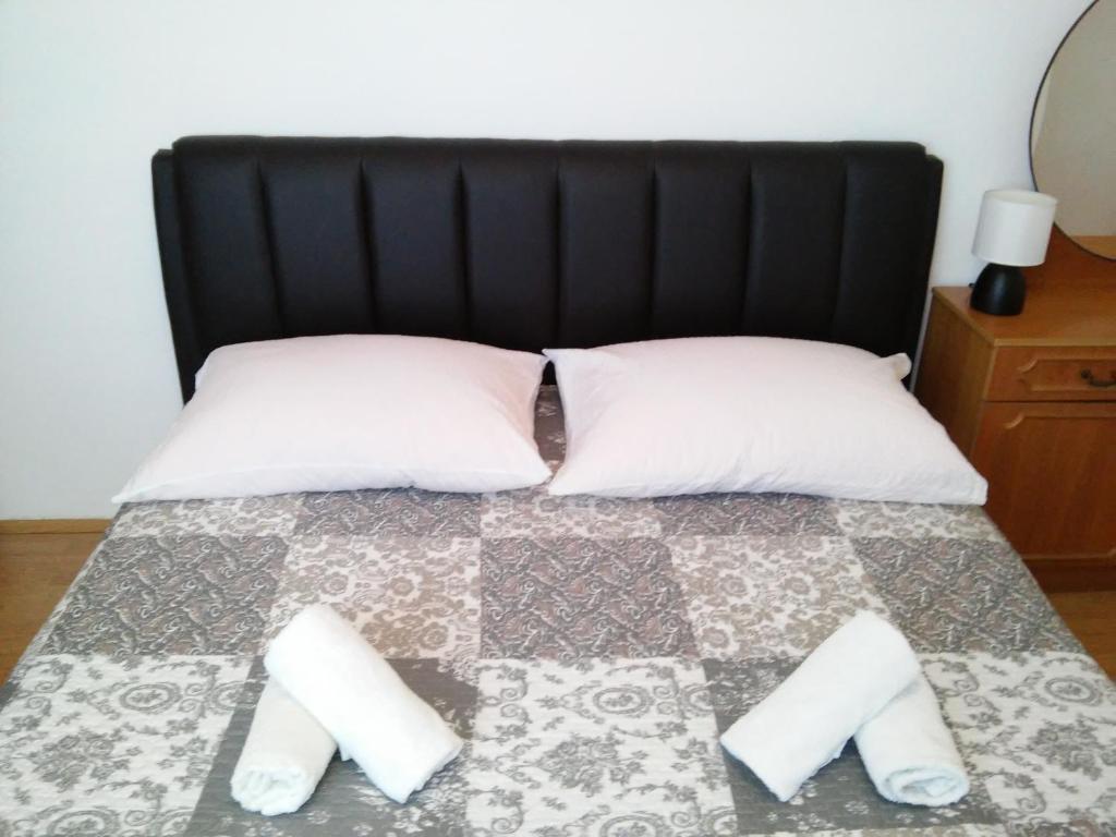 Postel nebo postele na pokoji v ubytování Apartment Doris