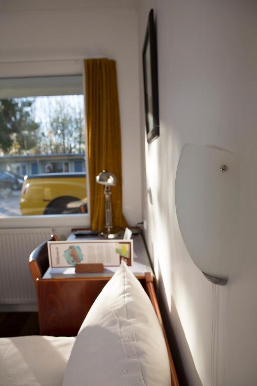 Postel nebo postele na pokoji v ubytování Wittrup Motel