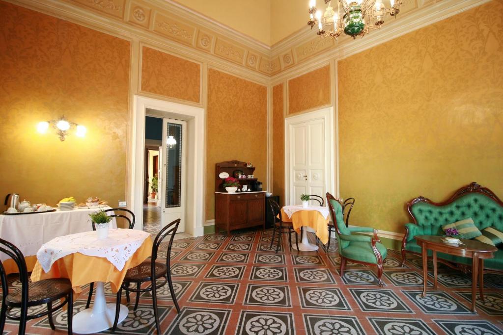 Posezení v ubytování Chez Moi Charme B&B