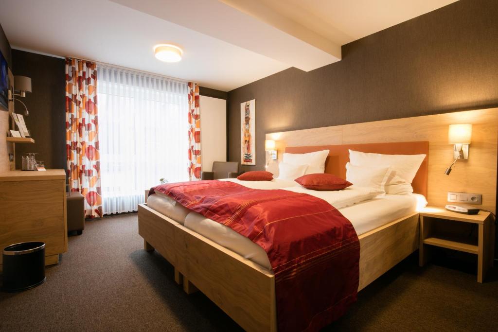 Postel nebo postele na pokoji v ubytování Relax-Hotel Pip-Margraff