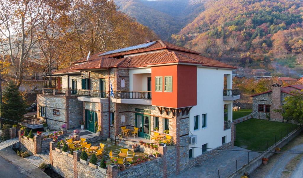 an aerial view of a house in the mountains at Evzin Hotel in Kato Loutraki