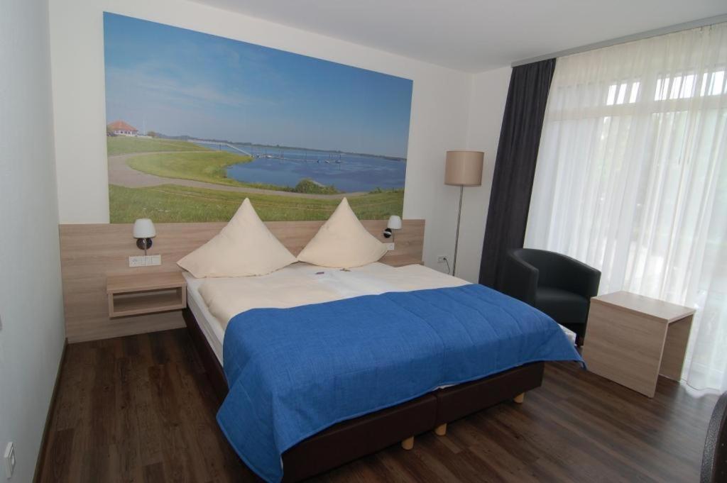 Postel nebo postele na pokoji v ubytování Ringhotel Alfsee Piazza
