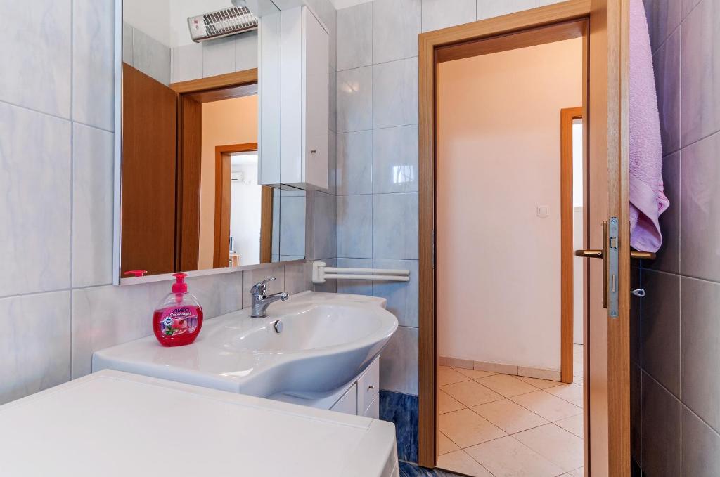 Łazienka w obiekcie Apartments Andrej