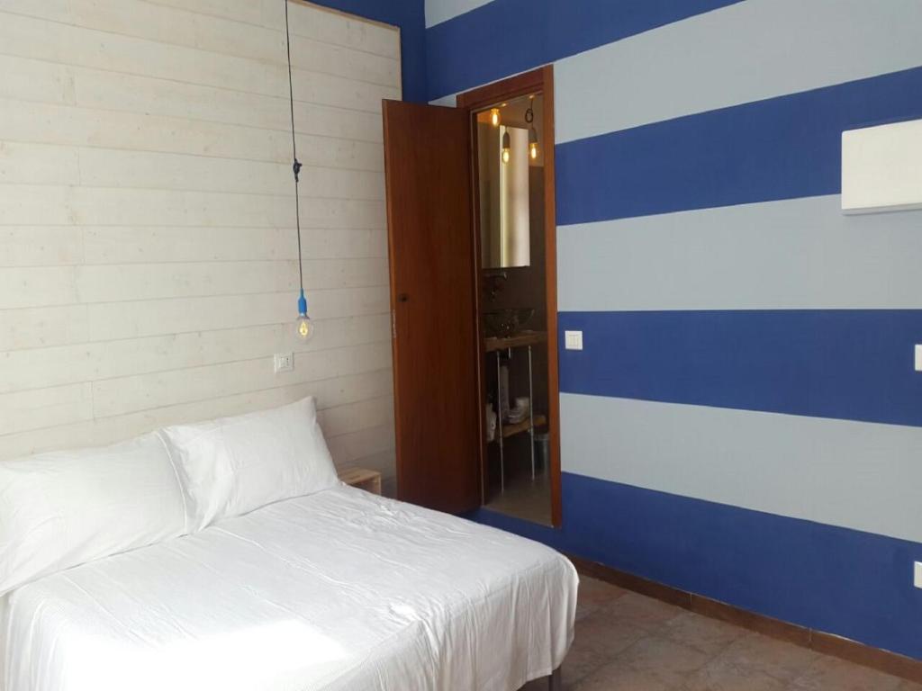 Posteľ alebo postele v izbe v ubytovaní Hotel Raphael