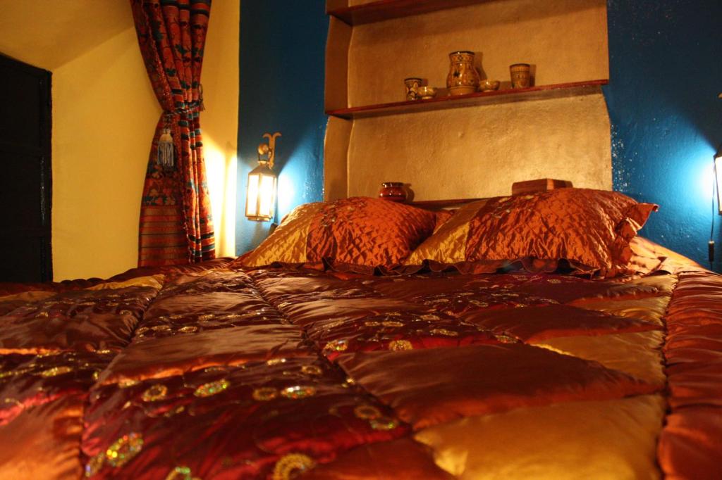 Postel nebo postele na pokoji v ubytování Riad Tiziri