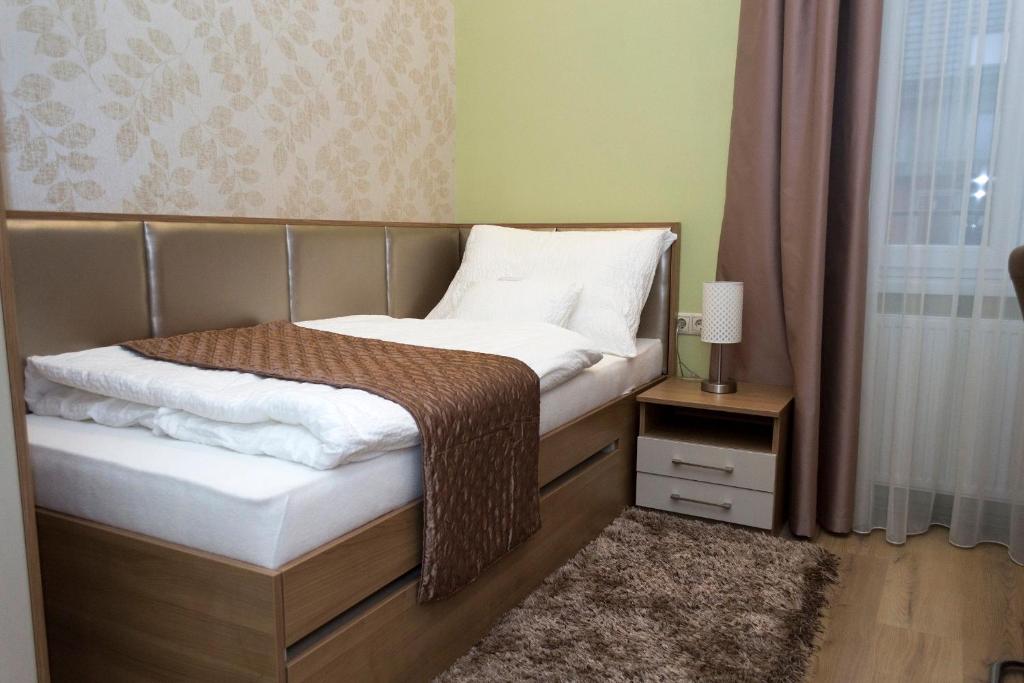 Posteľ alebo postele v izbe v ubytovaní Ditta Panzio