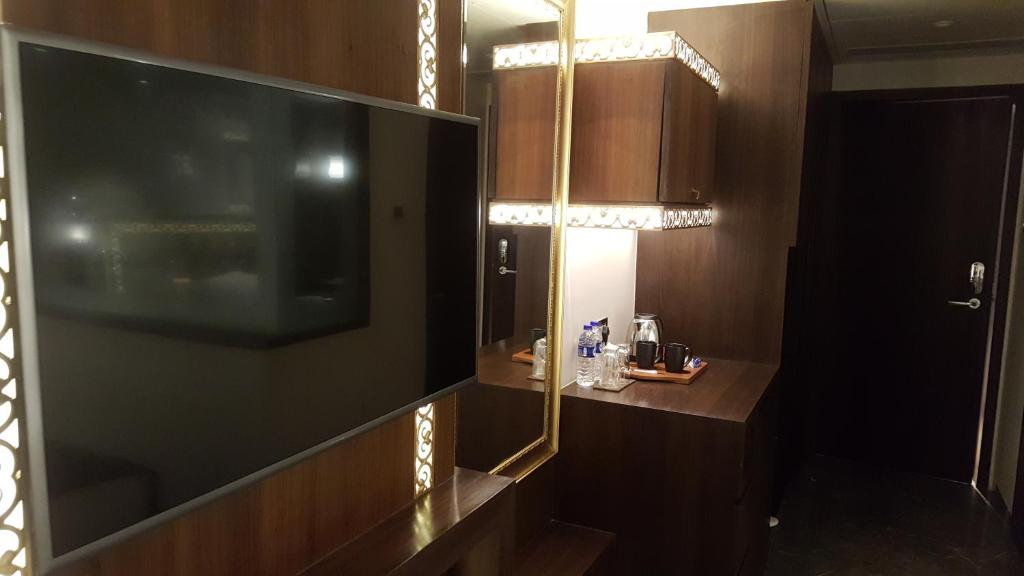 TV a/nebo společenská místnost v ubytování Hotel Peninsula Redpine