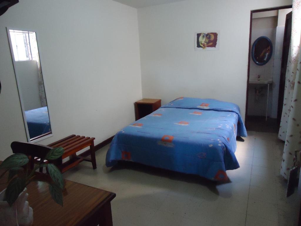 Krevet ili kreveti u jedinici u okviru objekta Hotel Estación Central