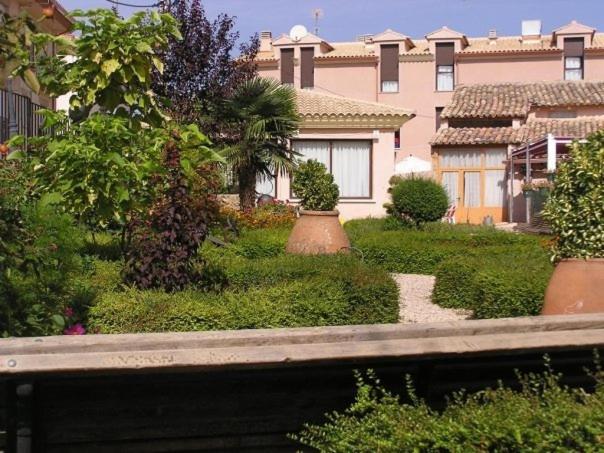 a large house with a garden in front of it at Arcas de Agua in Arcas