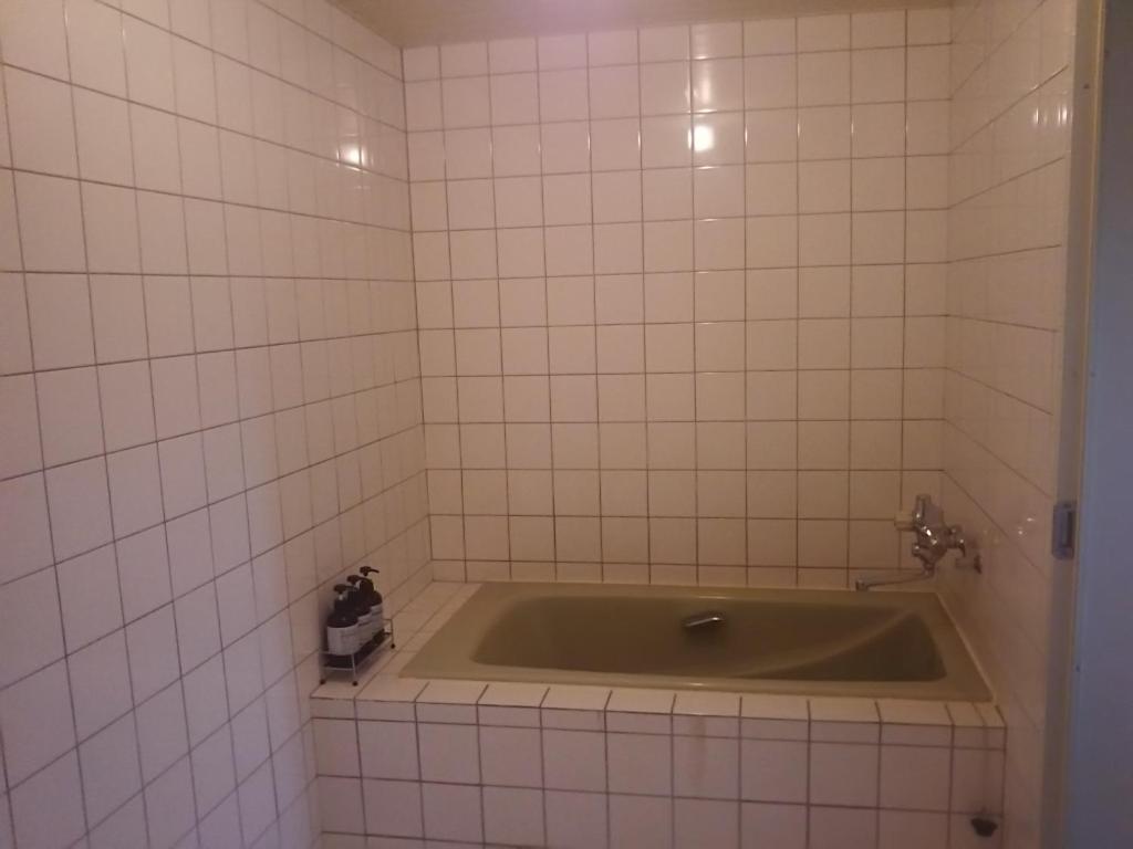 Koupelna v ubytování Hotel Sting