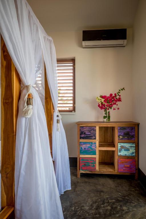 Postel nebo postele na pokoji v ubytování Windhoek Resort Bonaire