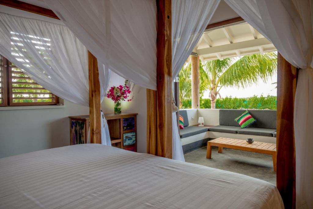 Postel nebo postele na pokoji v ubytování Windhoek Resort Bonaire
