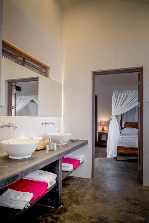 Postel nebo postele na pokoji v ubytování Windhoek Resort Bonaire