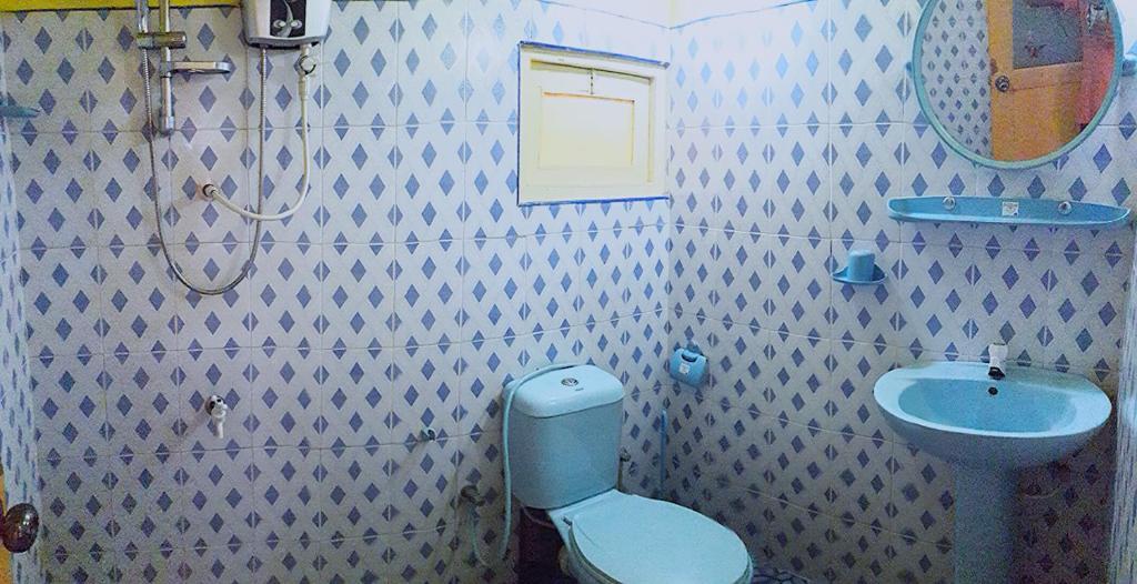 Koupelna v ubytování Apple Sara Home Stay