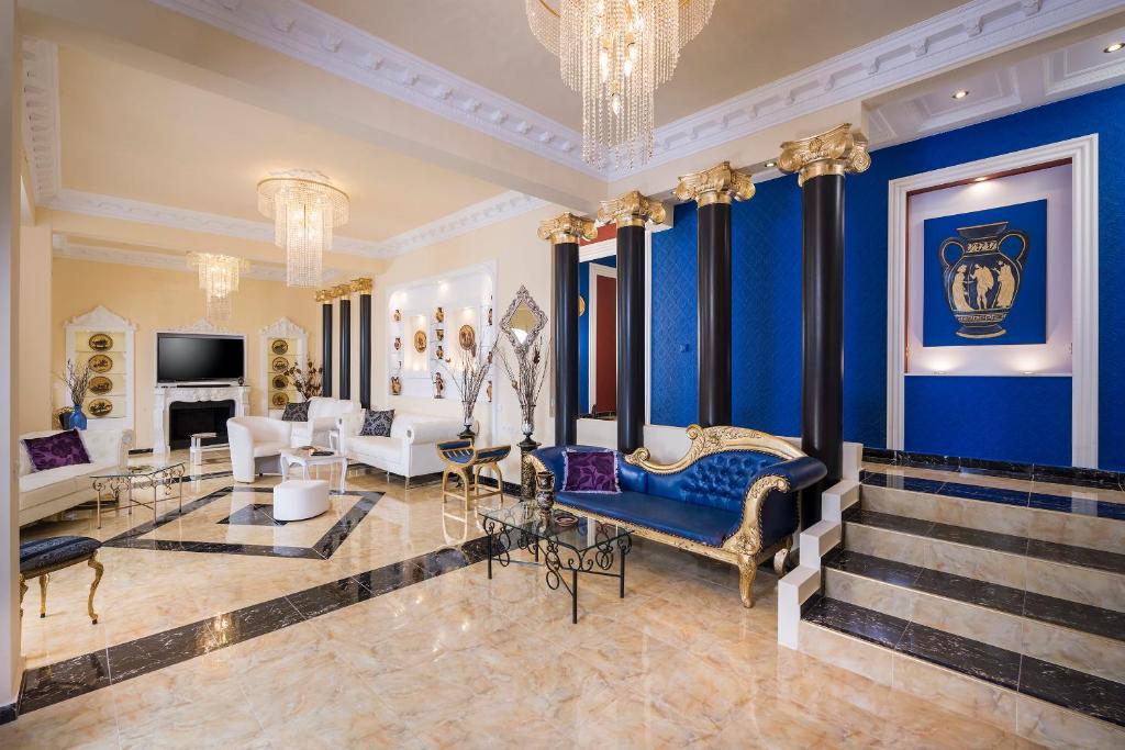 TV a/nebo společenská místnost v ubytování Pandis Palace