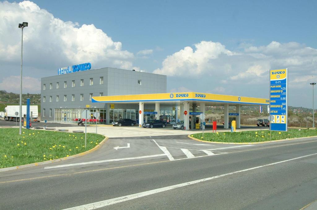 a mobil oil gas station with a road in front of it at Hotel Zovko in Slavonski Brod