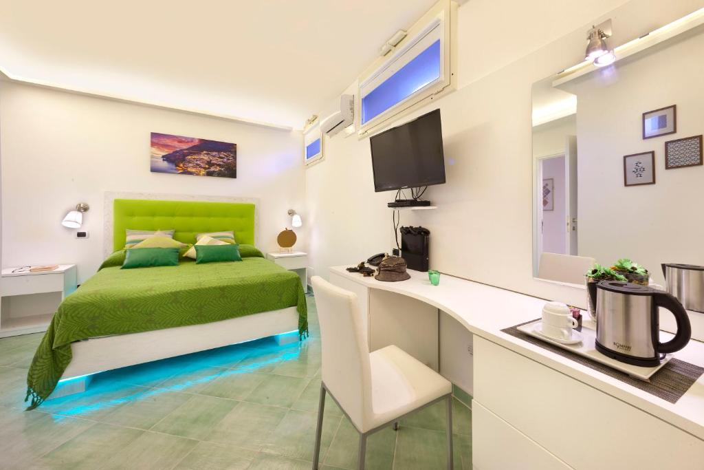 Postel nebo postele na pokoji v ubytování B&B Sorrento Central