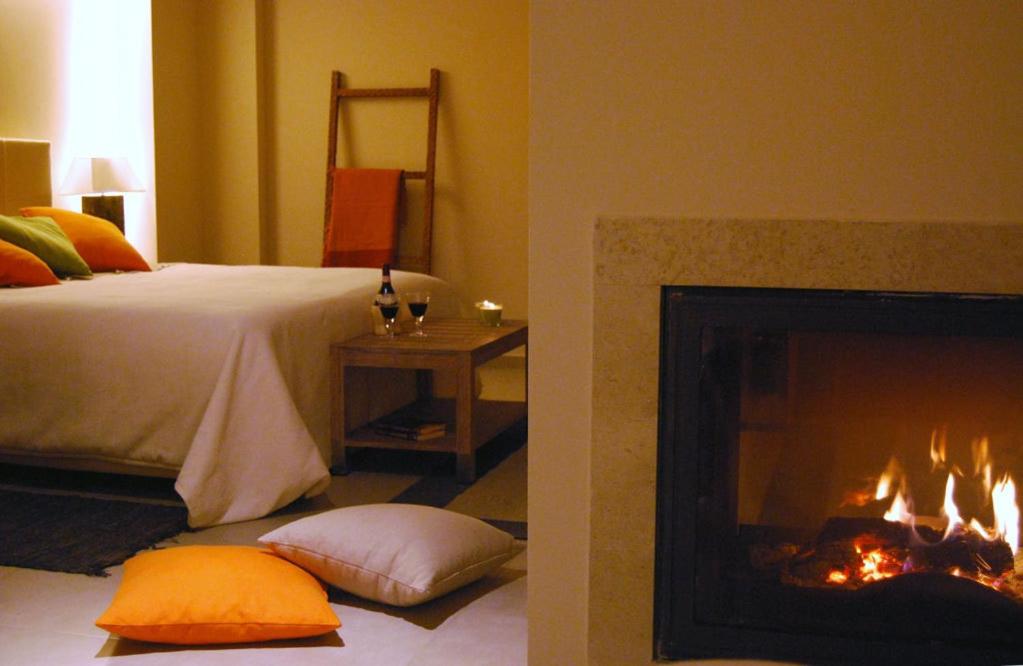 Postel nebo postele na pokoji v ubytování Astrolabe Hotel
