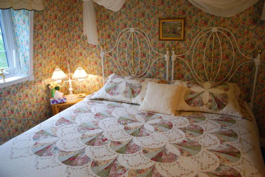 Postel nebo postele na pokoji v ubytování Maison Victoria