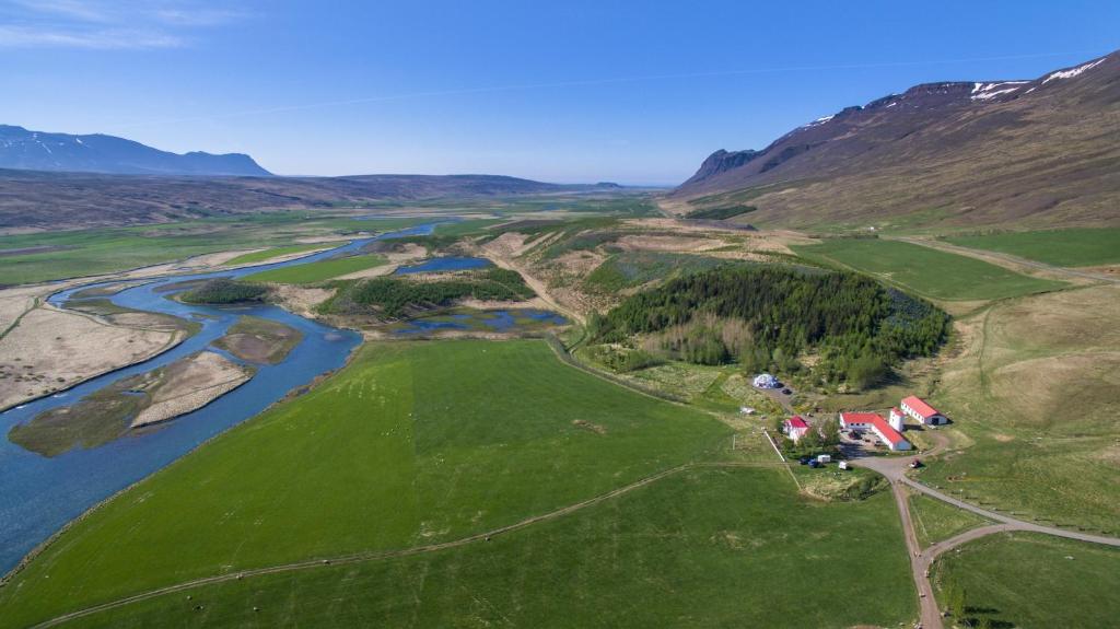 an aerial view of a river and mountains at Guesthouse Hof in Vatnsdalur in Hof i Vatnsdal
