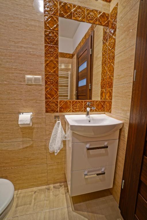 Kúpeľňa v ubytovaní Apartamenty Grodzka 8