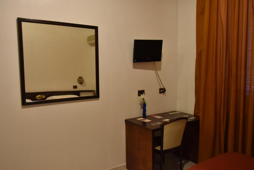 TV a/nebo společenská místnost v ubytování Hotel La Tripergola