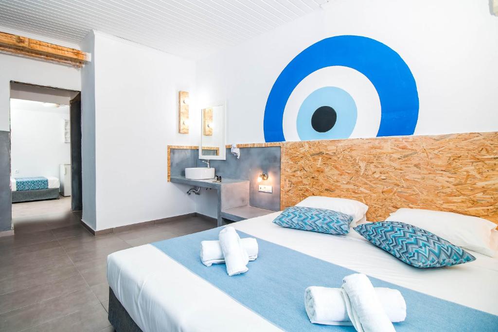 Posteľ alebo postele v izbe v ubytovaní Tinas Plus Hotel