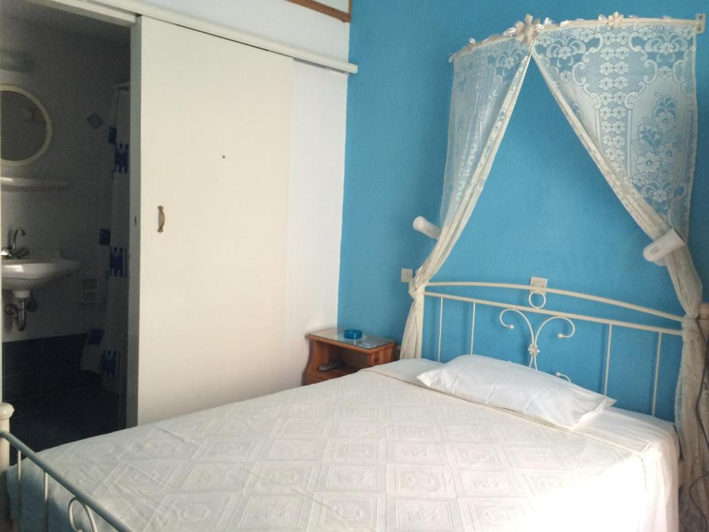 Posteľ alebo postele v izbe v ubytovaní Hotel Elizabeth