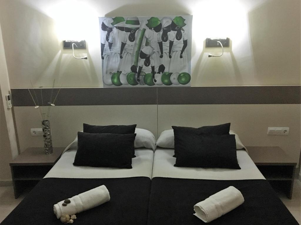 Cama ou camas em um quarto em Hotel Ancla
