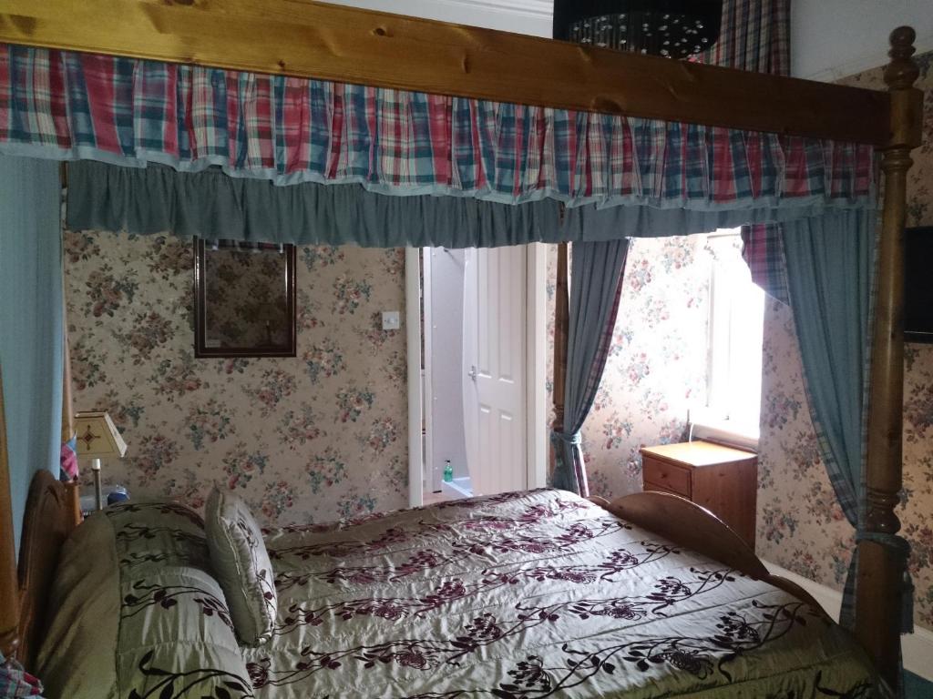 Postel nebo postele na pokoji v ubytování Albert Hotel