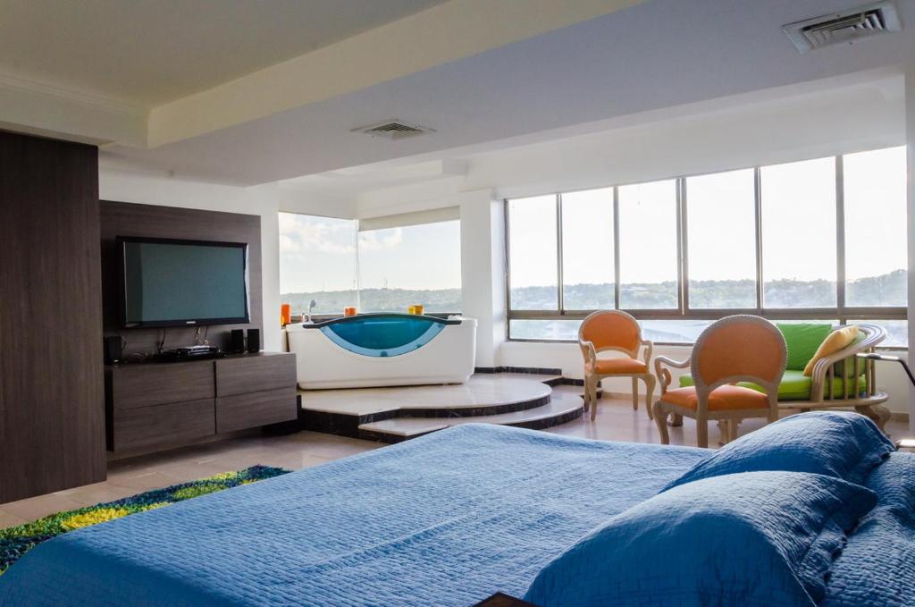 Ein Sitzbereich in der Unterkunft Apartamento DUPLEX OCEAN BLUE 1