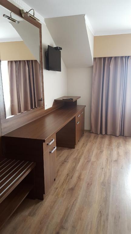TV a/nebo společenská místnost v ubytování Hanul Domnesc Imperial Hotel & SPA