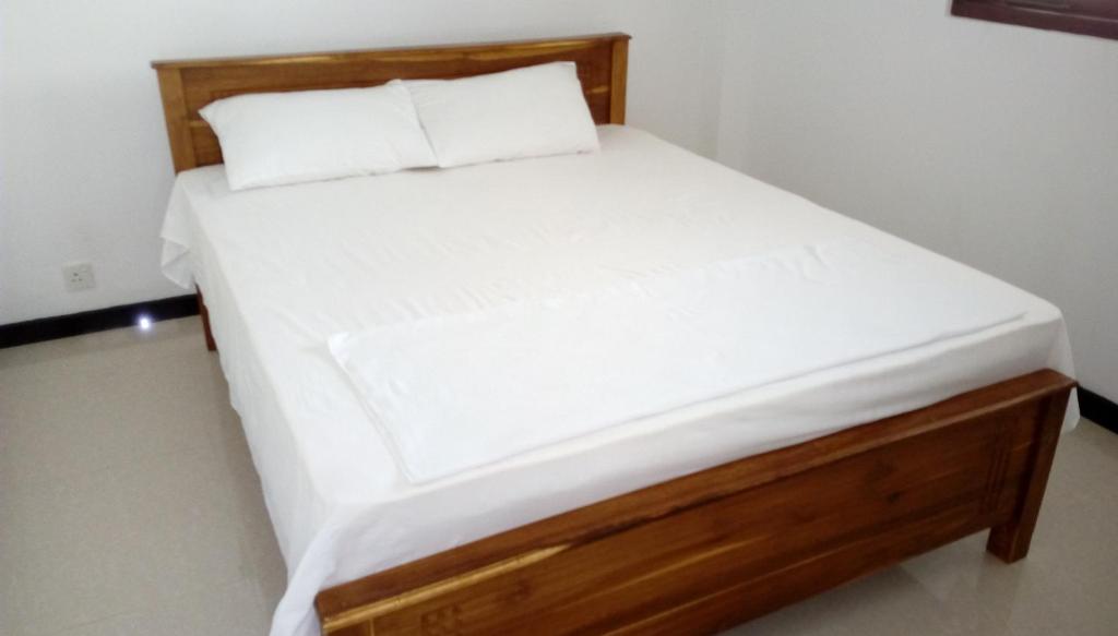 Postel nebo postele na pokoji v ubytování Dreams Villa