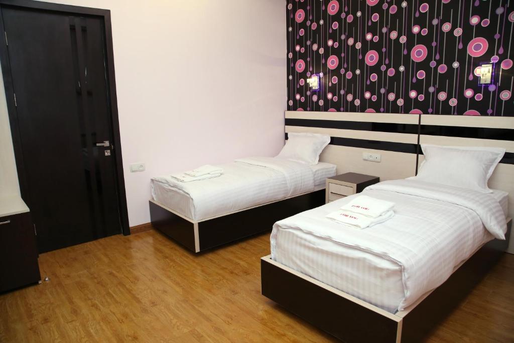 Postel nebo postele na pokoji v ubytování Hotel For You