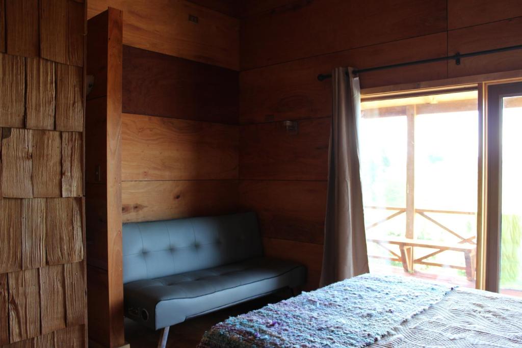 Postel nebo postele na pokoji v ubytování Hostal Boutique Los Arrayanes