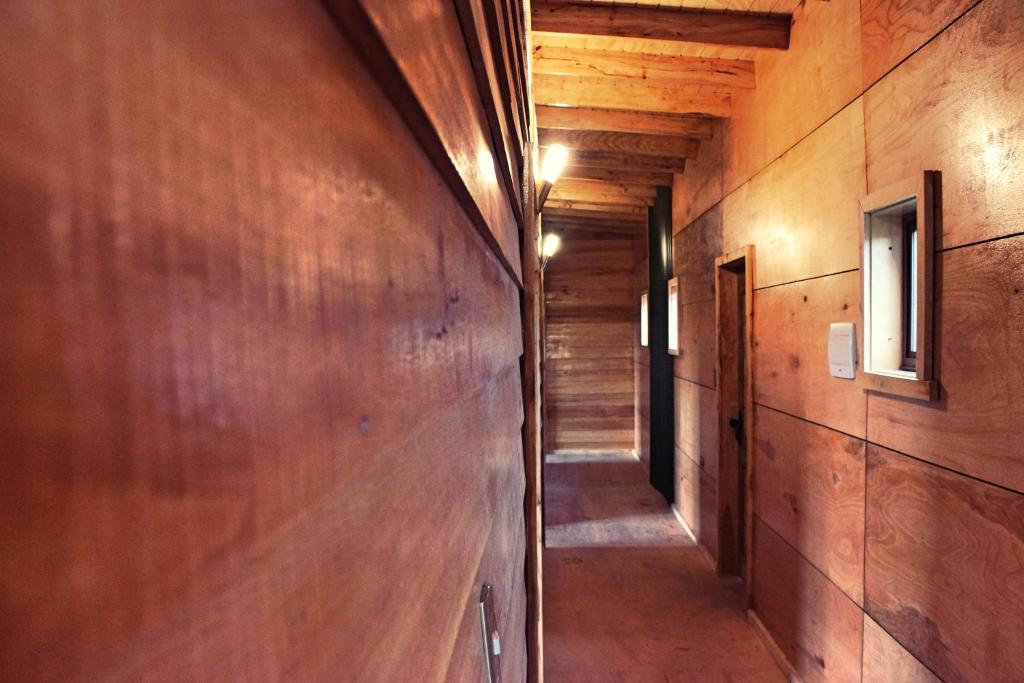 TV a/nebo společenská místnost v ubytování Hostal Boutique Los Arrayanes