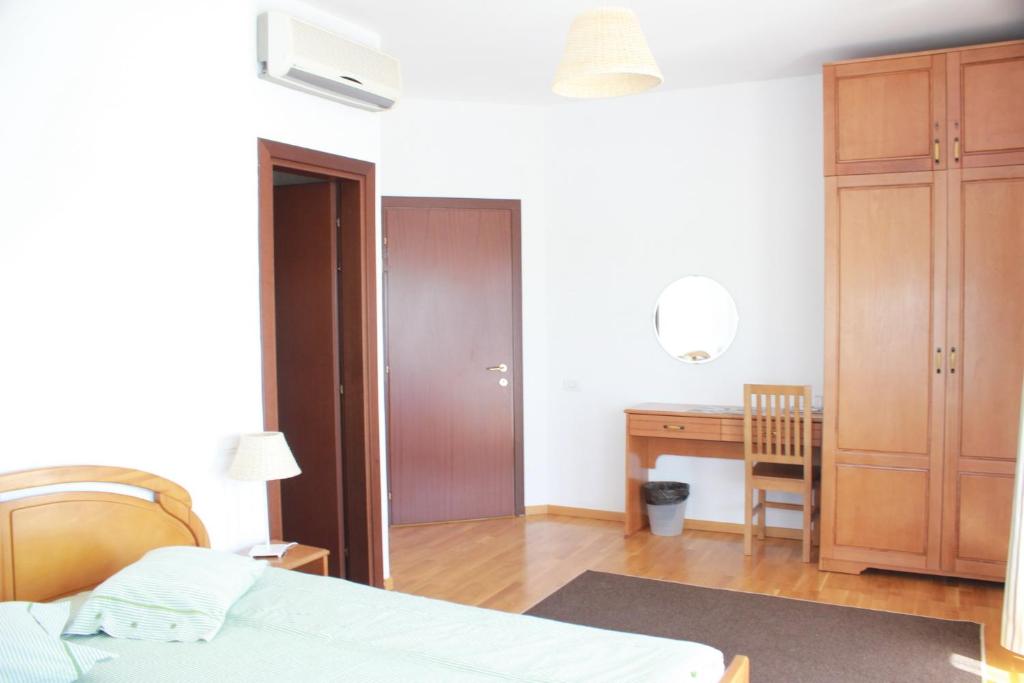 Postel nebo postele na pokoji v ubytování Casa Pescarilor