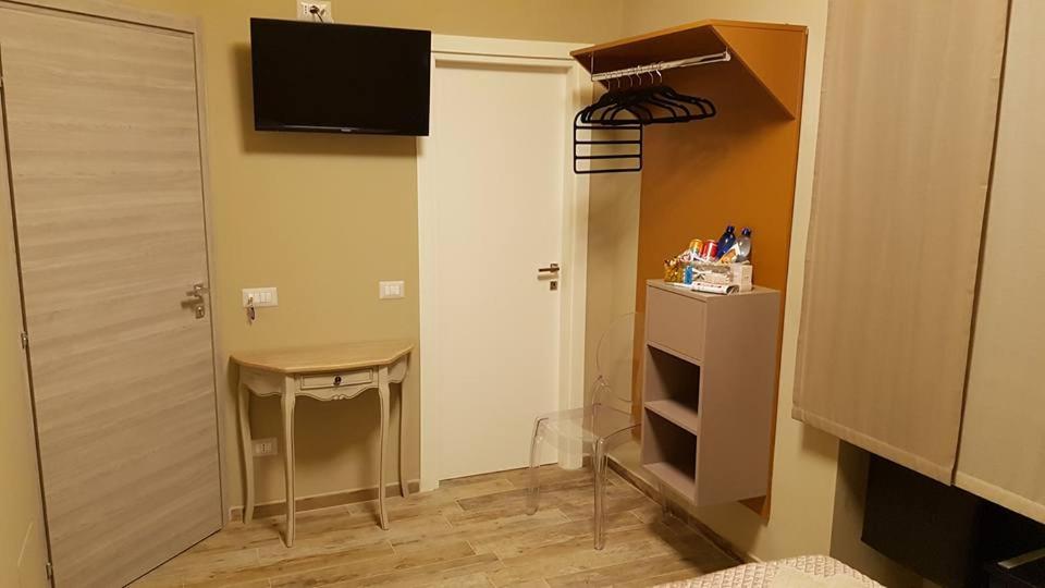 TV a/nebo společenská místnost v ubytování B&B VIA VENETO