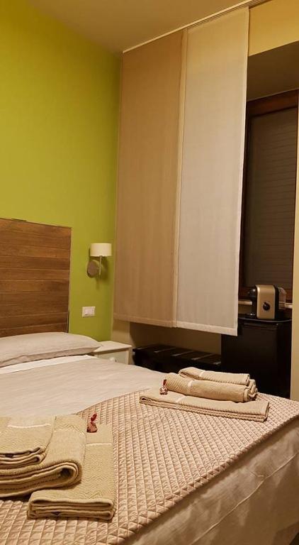 Postel nebo postele na pokoji v ubytování B&B VIA VENETO