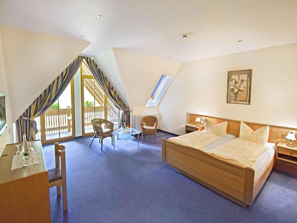 Postel nebo postele na pokoji v ubytování Hotel Walkenstein