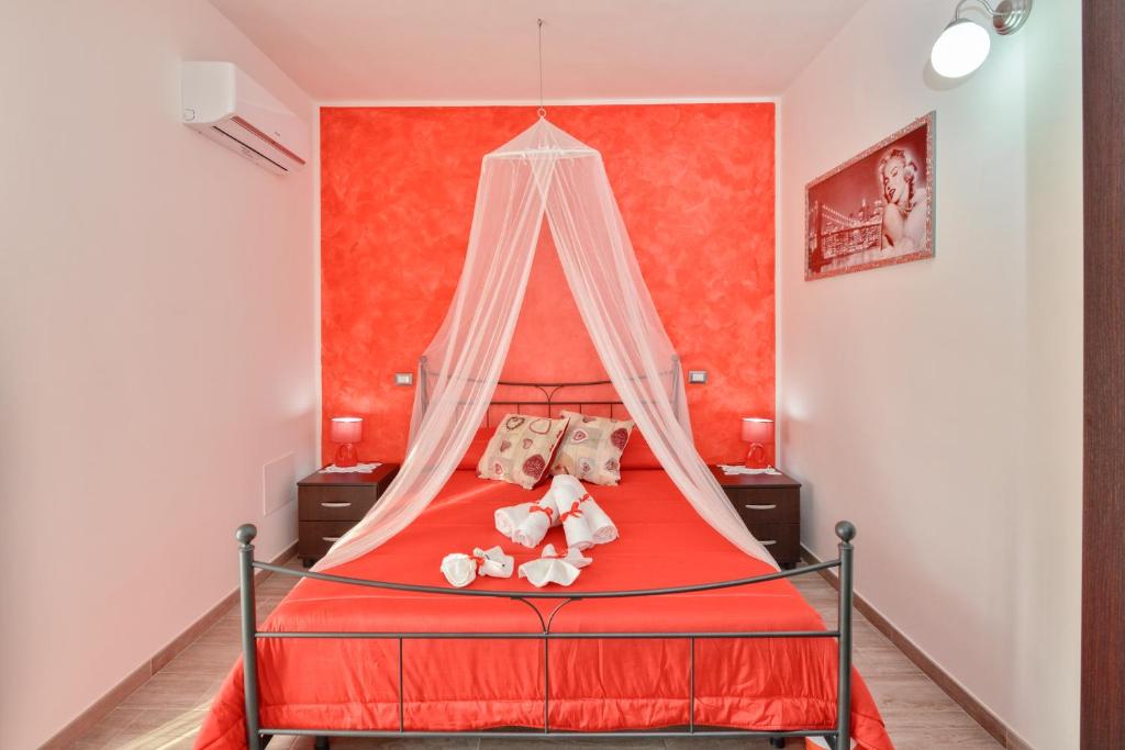Postel nebo postele na pokoji v ubytování Casa vacanze Il Salice