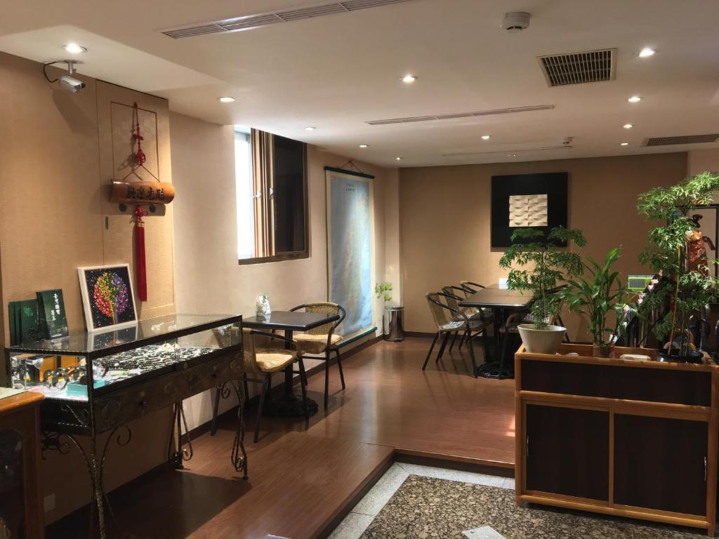 TV a/nebo společenská místnost v ubytování Fu Chang Hotel